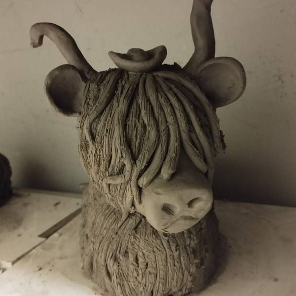 Clay Highland Cow with curved horns