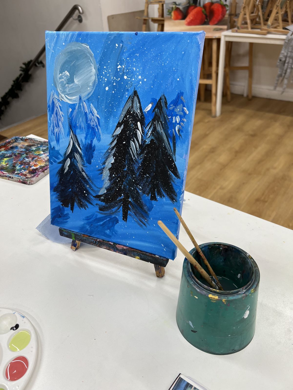 Light-up Christmas canvas of a snowy night sky